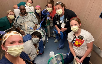 Terrell and his team of caregivers prepare to go outside.