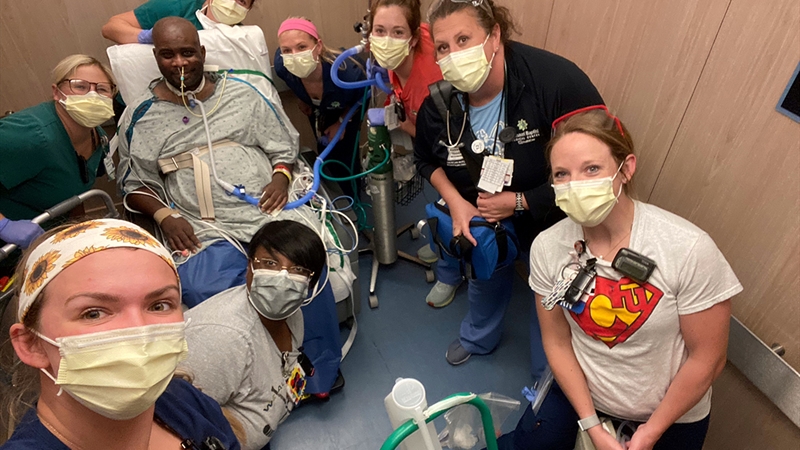 Terrell and his team of caregivers prepare to go outside.