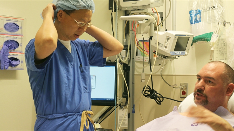 Dr. Xiaobin Yi discusses the procedure to adjust the spinal stimulator leads to better control John Witteman's pain.	